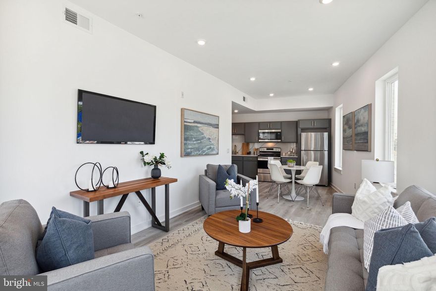 Available NOW | LEASING SPECIALS: $500 visa gift card if you apply within 24 hours of your showing AND only 1st month's rent and security deposit due upfront prior to move-in! 2 months FREE for an 18-month lease! $1,289/month net effective rent; $1450/month gross rent. Tenant to pay net effective rent monthly. | A physical tour is required before applying. Sight unseen applications will not be considered.

Welcome to Penn Reading! This gorgeous, professionally managed building is the perfect place for you to call home! Modern features collide with convenient living in these spacious 1 and 2 bedroom apartments, located in vibrant East Kensington. You’re sure to love the luxurious lobby showcasing an elevator and 2 separate stairwells for easy and secure access in and out of the building. An Amazon Digital Key Delivery Access ensures your packages will be delivered inside the building for added peace of mind. Conveniently equipped with central a/c for year-round comfort and in-unit laundry, each unit was custom engineered to offer peace of mind and well-being. The open floor plans provide a bright and airy atmosphere and ample room for you to customize your furniture arrangement. Enjoy kitchens that have never been used before and are fully equipped with cabinetry above and below, marble counters and backsplash, and sleek stainless steel appliances. Large windows offer abundant sunlight throughout and the bedrooms are sizable with sliding closet doors. The elegant bathrooms boast modern fixtures and lighted vanities with storage space. Unit #5B is a 1 bedroom, 1 bathroom apartment on the 5th Floor with giant windows and a large common area. This beautiful rental won’t last long – call today to claim this gem as your own! Please note: photos & video tour are from a similar unit within the building; exact layouts and finishes may vary.

Lease Terms:

Generally, 1st month, 12th month, and 1 month security deposit due at, or prior to, lease signing. Other terms may be required by Landlord. $55 application fee per applicant. Pets are conditional on owner's approval and may require an additional fee, if accepted. (Generally, $500/dog and $250/cat). Tenants responsible for: electricity, cable/internet, and flat water fee ($40/month for 1bed). Landlord Requirements: Applicants to make 3x the monthly rent in verifiable net income, credit history to be considered (i.e. no active collections), no evictions within the past 4 years, and must have a verifiable rental history with on-time rental payments. Exceptions to this criteria may exist under the law and will be considered.  Leasing specials are for new residents only. $500 visa gift card if you apply within 24 hours of your showing. The gift card will be issued after the lease start date.