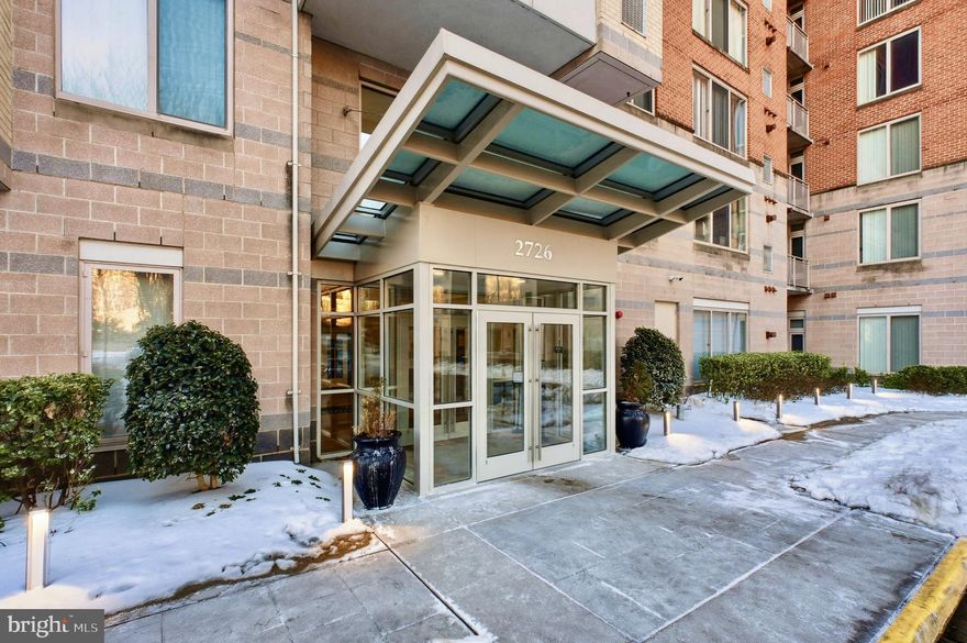 Experience elevated urban living in the heart of Merrifield.  Situated right across from Dunn Loring metro , Harris Teeters and lots of retail shops,  this beautifully maintained 1-bedroom, 1-bath high-rise condo delivers the ideal balance of style, comfort, and everyday convenience.   The fresh neutral paint gives this open-concept living and dining space an airy and welcoming feel.  The kitchen is thoughtfully designed with stainless steel appliances (from 2021-2023), granite countertops, and generous cabinet storage.  New full front load washer and dryer makes laundry an easy.    The bedroom generously sized, it is quiet and private, completed with a large walk-in closet and private balcony access.    Wilton House residents enjoy an impressive lineup of amenities, including 24-hour front desk service, secured garage parking, rooftop pool, fitness center, business center, party room with fireplace, game room with kitchen, pool table, and outdoor patio space.   The Mosaic District is only minutes away, with quick access to I-495, I-66, Route 50, and Gallows Road.   Don't miss the opportunity to make it yours! Welcome Home!