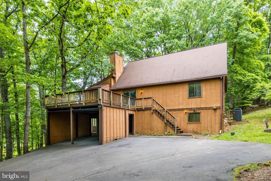 ****REDUCED!****INCREDIBLE OPPORTUNITY TO OWN THIS UNIQUE GEM THAT NEEDS SOME TLC ON THE NORTH SIDE OF WARRENTON!  *  THE POTENTIAL IS ENDLESS * NEEDS SOME WORK BUT 100% LIVABLE! * COME HOME TO YOUR CHALET RETREAT NESTLED AMONGST THE TREES! * ENJOY WATCHING THE DEER WHILE HAVING YOUR MORNING COFFEE ON ONE OF THE DECKS OR THE SUN PORCH * GORGEOUS 1.3+ ACRE LOT * DECKING ON 3 SIDES  * SHED * 4/5 BEDROOMS * 3 FULL BATHS * 2 FIREPLACES * EXPOSED WOOD BEAMS IN CATHERDRAL CEILING IN LIVING ROOM OFF KITCHEN WITH FULLY EQUIPPED WET BAR * GLEAMING HARDWOODS * SUN PORCH * BEDROOM(S) ON ALL 3 LEVELS * OFFICE ON LOWER LEVEL COULD SERVE AS A 5TH BEDROOM * PLENTY OF STORAGE * DON'T MISS YOUR CHANCE TO OWN THIS VERY COOL HOME PERFECT FOR ENTERTAINING!