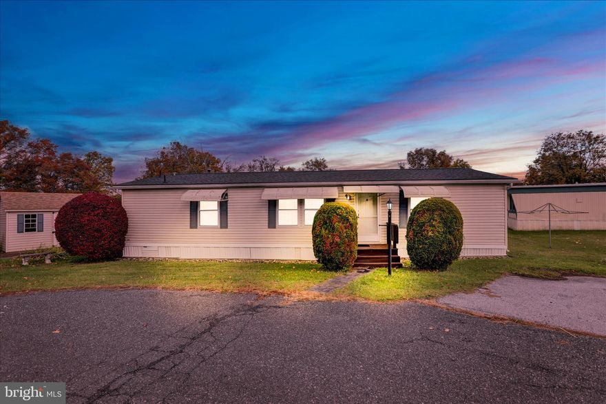 Welcome to 8758 Turkey Ridge Road in the "Green Acres" community in Upper Macungie Township. This 1152 square foot 3 bedroom, 2 full bathroom doublewide ranch style home offers the best of one floor no steps living in the Parkland School District. Step inside to the spacious living room with sliders to the rear deck. Open floor plan connects the living room to the full eat-in with dining area white kitchen that is fully equipped and ready to prepare those upcoming holiday dinners. The master bedroom is tucked away on the one end of this unit beyond the kitchen and offers a full tub/shower bath and plenty of closet space. 2 additional generous sized bedrooms and a second tub/shower full bath are located on the opposite end of this unit. All this plus in unit washer and dryer included, central air, shed and new(er) roof & windows. Lot lease fee includes water, sewer, trash and access to the community pool making this the one to see! Schedule your showing today!