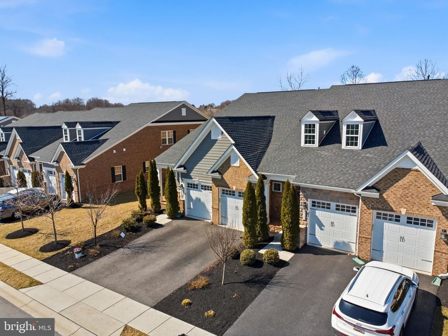 NEW PRICE! Motivated Seller!
Welcome to refined, low-maintenance living in an unbeatable location! Zoned for the area’s top-rated schools, this immaculate 2019-built end-unit townhome in the highly sought-after Fairways at Turf Valley backs directly to the Hialeah Course’s 3rd hole and boasts over 4,300 sq. ft. of luxury.

The open-concept main level shines with hardwood floors, high ceilings, and a gourmet chef's kitchen featuring a massive quartz island, stainless steel appliances, and a walk-in pantry. Entertain effortlessly, relax on the custom composite deck overlooking the fairway, or retreat to the convenient main-level owner's suite with a spa-inspired bath and large walk-in closet.

Upstairs features a versatile loft, two spacious bedrooms, a full bath, and a dedicated home office. The fully finished walk-out lower level expands your living space with a vast recreation room, an additional full bath, and abundant storage.

Enjoy a true lock-and-leave lifestyle with HOA-maintained grounds. You are perfectly positioned just minutes from Turf Valley Resort, fine dining, boutique shopping, and major commuter routes (I-70, Route 29, and Route 100).