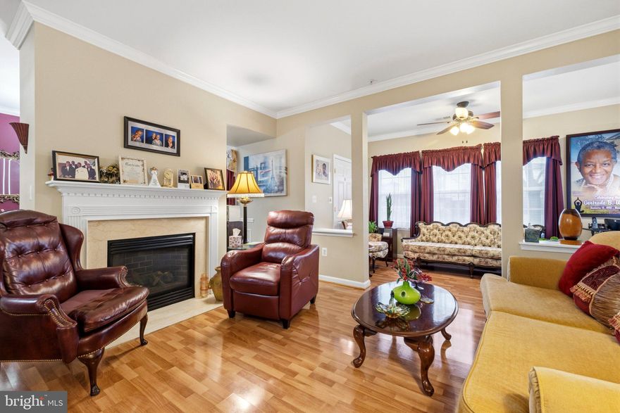 This charming 2-bedroom, 2-bathroom condo offers roughly 1,500 sq. ft. of living space, perfect for creating lasting memories. The open floor plan invites natural light, enhancing the warmth of the wood floors and crown moldings throughout. Enjoy culinary delights in the well-appointed kitchen featuring new stainless steel appliances. The cozy living area, complete with a fireplace, is ideal for relaxation or entertaining friends. The primary suite boasts an en-suite bath, ensuring comfort and privacy. Step outside to enjoy the beautifully landscaped garden views, or take advantage of the community amenities, including indoor and outdoor pools, a fitness center, and a welcoming community center. With custodial services, lawn maintenance, and security features like a gated entrance and intercom system, you can enjoy a carefree lifestyle. Cameron Grove also offers a variety of social activities and spaces, from a library to meeting rooms, ensuring there's always something to engage in. Assigned parking and easy access to transportation services make this home as convenient as it is inviting. Embrace a lifestyle of comfort and community in this delightful condo! Recent updates include new stainless steel appliances, water heater and HVAC.