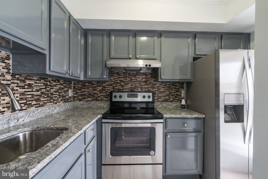 Pergo wood flooring in the living room, dining room and bedrooms. Beautiful kitchen has been updated with newer granite countertops, back splash, sink, stove, refrigerator, and dishwasher. 3 bedrooms and 2 full bathrooms. Private balcony-