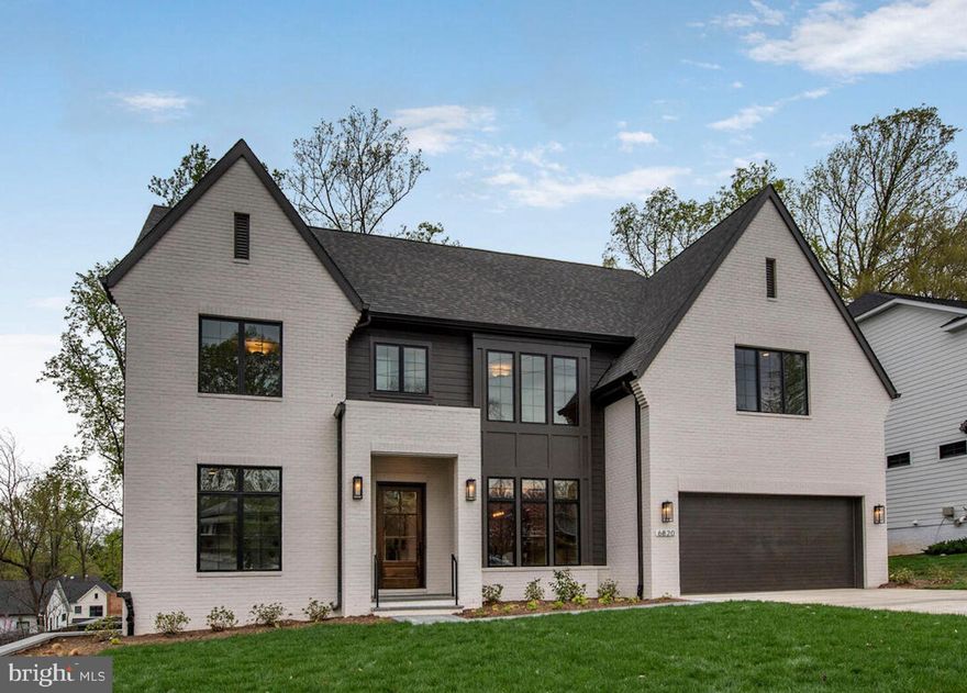 This is not just another new build—it is a custom architectural statement that stands apart from the ordinary. By appointment only. Welcome to 6820 Marbury Road, a one-of-a-kind new construction home in Kenwood Park Bethesda. Situated on an expansive 11,580-square-foot flat & private lot just blocks from Walt Whitman High School, this home is thoughtfully designed by the award-winning in-house architectural team at Paramount Construction. Every detail has been carefully crafted to blend timeless elegance with modern functionality, ensuring this home is as unique as the family who will live in it. Unlike mass-produced new homes, the Brentwood model was custom-designed to fit this specific lot, maximizing natural light, privacy, & the surrounding views. The lower elevation of the rear neighboring lot allows for unobstructed sightlines and dramatic western sunset views, flooding every room with warmth & natural light. Carefully placed transom windows & quad-sliding doors further enhance the bright & airy atmosphere, making every space feel uplifting and inviting. The first floor features a private guest suite with a full bath, a zero-threshold shower, and a walk-in closet—perfect for multigenerational living, long-term guests, or a quiet home office.

Inspired by the grandeur of Brentwood, Tennessee’s luxury estate homes, this residence features a painted Shoji White Queen brick front elevation with subtle corbelling at the gables. A smooth cement parged foundation enhances its refined aesthetic, while upgraded front & rear landscaping complement the sophisticated architecture. The striking black Pella windows contrast beautifully against the Shoji white brick, creating a timeless yet modern exterior. The custom flagstone walkway, set in an elegant architectural diamond pattern, offers a distinguished entrance that immediately sets this home apart. Inside, the open-concept main level boasts ten-foot ceilings & a seamless flow between the library, dining room, great room, & breakfast nook. Expansive walls of glass connect the indoor & outdoor living spaces, leading to a large deck & screened-in patio with a gas fireplace, perfect for year-round entertaining. An optional three-stop elevator provides convenience & accessibility to all levels.

The chef’s kitchen is a masterpiece, designed for both elegance and functionality. It features top-of-the-line appliances, custom handcrafted cabinetry, and a striking Calacatta Laz Quartz island—a space perfect for everything from casual family meals to formal entertaining. A spacious walk-in pantry, located just off the mudroom, provides ample storage, & the heated garage adds a level of comfort during colder months. Thoughtfully curated architectural details, including coffered ceilings, white oak ceiling beams in the kitchen & primary bedroom, & handcrafted built-ins throughout, give this home a level of customization and craftsmanship rarely found in new construction. Upstairs, the private living quarters include spacious en-suite bedrooms with walk-in closets. The primary suite is a true sanctuary, featuring soaring 18-foot ceilings, abundant natural light, & two expansive walk-in closets with a custom-designed furniture island for added elegance. The spa-like primary bathroom is designed for ultimate relaxation, featuring a rain shower, a heated towel rack, & custom-fabricated cabinetry crafted by a local artisan. The lower level is designed for both entertainment & functionality, featuring a spacious mirrored exercise room, ample custom storage solutions, & a large recreation space perfect for gatherings. No detail has been overlooked in the design of this home. From carefully integrated interior design elements & custom niches to luxurious, hand-selected finishes, every space is crafted to feel both sophisticated & inviting. The powder room features a furniture-style vanity with an elegant, understated wallpaper accent, adding a touch of refinement.