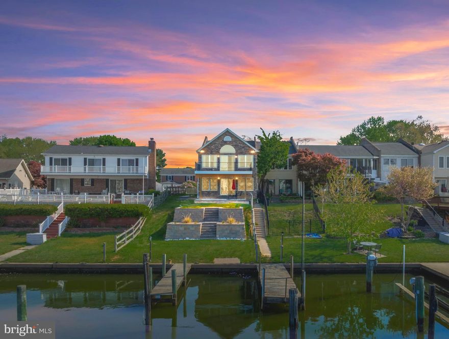**Rare Waterfront End-of-Group Townhome offering 2 bedrooms, 2 full bathrooms, and just under 2,500 square feet of finished living space in the highly sought-after water-oriented community of Rumsey Island.

Step into the main level of this massive townhome where the open layout and direct water views will immediately capture your attention. Featuring laminate wood flooring, ample recessed lighting, and impressive crown molding, this versatile space is ideal for entertaining friends and family after a day on the water. Use it as a large recreation room, game room, or explore the potential to create a spacious primary bedroom overlooking the water. The main level also includes a full bathroom, storage closet, under-stair storage, and a utility room with a full-size washer and dryer plus laundry sink.

The exterior is truly the showpiece of the home, offering approximately 36 feet of waterfrontage. The seller spared no expense with a brand-new professionally engineered two-tier stamped retaining wall system with soil stabilization, all-new Belgard patio area and walkways, a brand-new composite deck, and a brand-new roof with architectural shingles, gutters, and flashing. Perfectly positioned on a cove, owners enjoy two piers, including one shared pier, with approximately 4 to 5 feet of water depth near the piers. Enjoy endless waterfront activities including powerboats, jet skis, kayaks, paddle boats, paddleboarding, and more.

The spacious, light-filled upper level is the perfect place to unwind after a day on the water. It features an open kitchen with ample cabinet space, a convenient dining area, and a large great room with vaulted ceilings, recessed lighting, and breathtaking water views. Step outside to the brand-new composite deck and take in beautiful sunsets. This level also offers two bedrooms, one full bathroom, and a hall linen closet.

Additional highlights include a water heater replaced in 2023, private 2-car parking pad, front porch sitting area, front porch storage shed, side yard shed, stainless steel double-door refrigerator with water dispenser and ice maker, pull-down attic stairs, and electric service on the pier.

Don’t miss this rare opportunity to own a waterfront townhome in the close-knit community of Rumsey Island where neighbors truly look out for one another. Be sure to check out the impressive 3D virtual tour and schedule your private showing today. This one will not last long.