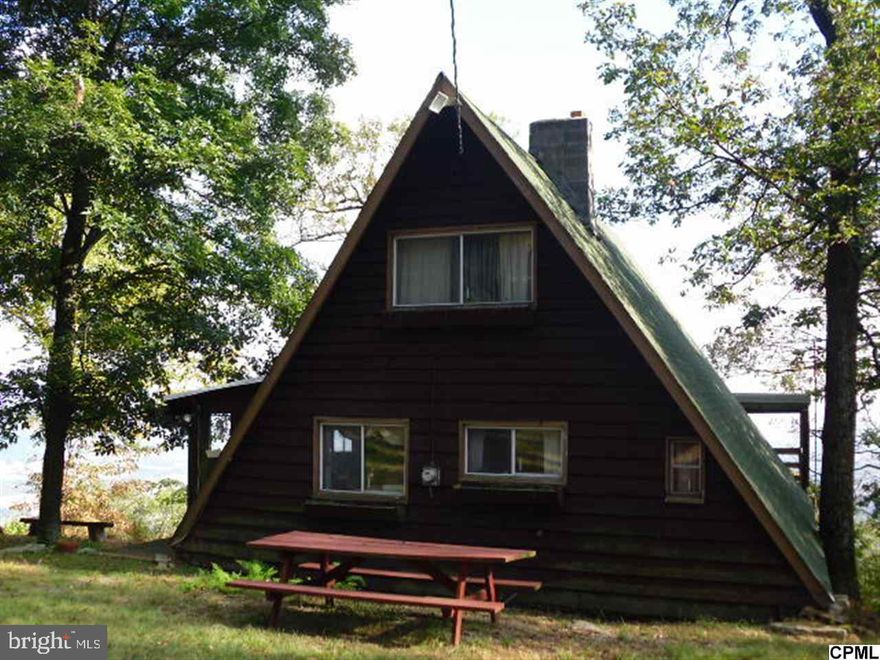 MILLION DOLLAR VIEWS! RARE OPPORTUNITY TO OWN A HOME THAT YOU CAN SEE FROM HARRISBURG TO CHAMBERSBURG FROM YOUR BACK DECK. A-FRAME HOME OFFERS 2 BEDROOMS, 1 BATH, WOOD STOVE, 1.6 ACRES, WELL & SEPTIC. EXPERIENCE NATURE AT ITS FINEST. BEING SOLD AS IS.