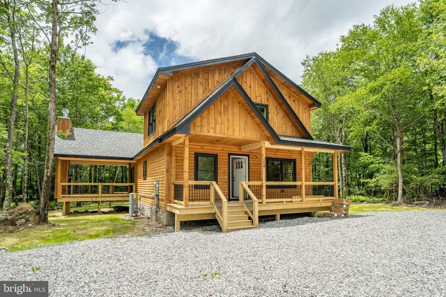 *NEW CONSTRUCTION* Elegant Mountain Home at Deep Creek Lake! This brand new log home sits on over half an acre of wooded land and adjoins the scenic Lodestone Golf course. Half a mile from the slopes at WISP resort, this 5bed 5.5bath offers easy access to all of Deep Creek's 4 Season Recreation, tucked away in a private community, insulated from any seasonal traffic. Featuring vaulted ceilings, stacked stone fireplace, modern gourmet kitchen, granite tops and rustic hardwood accents throughout. Loft, kitchen island, great room and lower level rec room offer plenty of indoor entertainment space on those rainy days, or relax outside next to the covered outdoor fireplace any time of the year. Excellent rental opportunity, or perfect for your private mountain lake retreat. Call today for details!