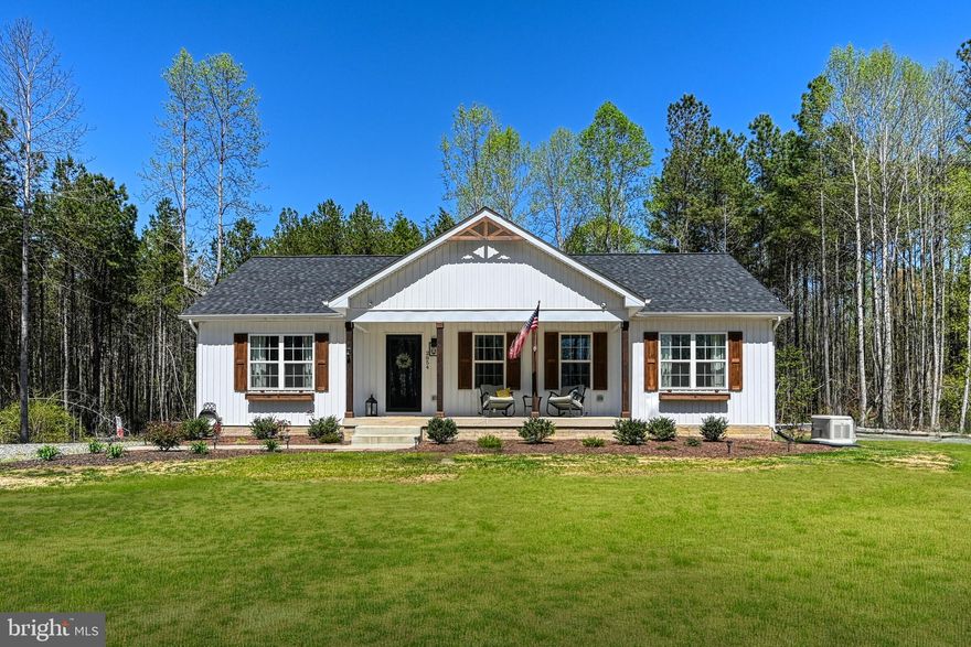 Welcome to this like new 5-bedroom, 2 bathroom home nestled on 6 private acres! This beautiful property features an open floor plan with vaulted ceilings-perfect for entertaining family and friends. The spacious primary suite includes a walk-in closet, soaking tub, and a separate shower. Two additional bedrooms and a full bath are located on the main level.  Downstairs, you'll find a large recreation area, a fourth bedroom an office (NTC but possible for a bedroom) and a storage room. The basement has a rough in for a full bathroom. A whole house generator provides peace of mind during any weather. Enjoy the perfect blend of privacy and functionality with open space for a garden or small farmette, plus trails already in place for ATV's. 12x20 workshop with room to work on projects, shelving for your tools and an add on to park your gator or tractor! There's also ample room to build your dream garage. 
Conveniently located near Lake Anna, the Town of Mineral and Louisa! Don't miss this opportunity to own your private retreat!