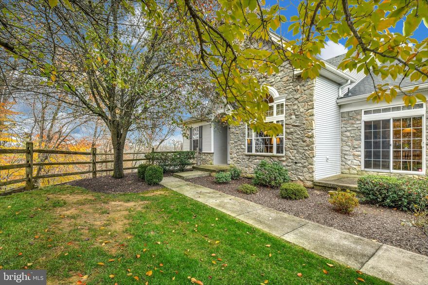 Desirable Four Seasons at Saucon Valley offers an outstanding opportunity to downsize in style in this active over 55 neighborhood. Hillside Views is one of the largest units and lots in the neighborhood, with stunning long-range views from the back that look out over tall trees, mountains, and Saucon Creek.

     This open floor plan features hardwood floors, crown moldings, and sun-filled rooms on three levels. The main floor boasts two bedrooms, office space, and a floor-to-ceiling Palladian window in the living room. The kitchen offers lots of prep and counter space as well as a cozy breakfast area with access to the patio. The main level owner’s suite features an en suite bath and two walk-in closets outfitted with organizers.  An extra bedroom in the upstairs loft has a vaulted ceiling and clever built-ins. The finished lower level invites opportunities to host large crowds with high ceilings and two sets of sliding glass doors that lead to a patio and  sun-dappled backyard. A floor-to-ceiling stone gas fireplace and built-in entertainment center are open to the pub style bar with hardwood counters, bottle storage and full sized refrigerator. A full bath and bonus room are on this level as well. 

     Exterior home and grounds maintenance are a thing of the past, allowing for enjoyment of the community pool, tennis courts, and clubhouse. A two-car garage, public water and sewer, and natural gas for heating are noteworthy amenities. Nearby grocery stores, restaurants, golf courses, and thoroughfares are easily reached and the area’s renowned hospital campuses are within a short radius.