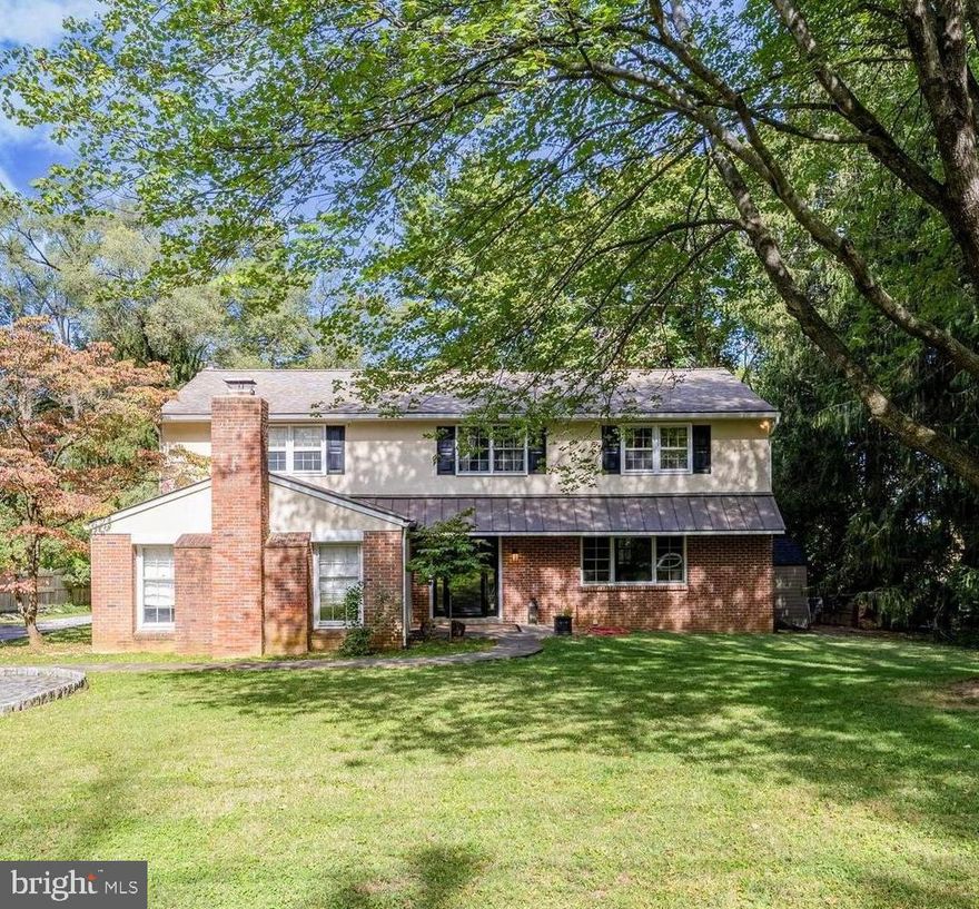 Welcome to this expansive 4-bedroom, 2.5-bath Colonial, nestled in the highly desirable Lafayette Hill section of Springfield Township. This move-in ready home has been meticulously cared for over the years and is sure to impress. With plenty of living space and endless potential to expand the kitchen and other spaces, this home is an entertainer's dream.
The main floor greets you with a lovely center hall and a light filled formal living room featuring elegant glass French doors and a wonderful bay window. Enjoy the cozy family room with a beautiful brick fireplace, beamed ceiling, wet bar, ample closet space, plus access to the side yard. Just beyond the family room, you'll find a convenient laundry area and a den/office with an additional fireplace, as well as a powder room. The spacious eat-in kitchen includes newer stainless steel appliances and offers plenty of room to cook and entertain, with access to the back terrace for seamless indoor-outdoor living. A formal dining room completes this level, connected to the living room by another set of beautiful glass French doors.
Upstairs, the primary suite is expansive, with plenty of space for a sitting area. Enjoy a newly renovated en-suite bathroom with a stall shower, and a thoughtfully designed walk-in closet with a built-in closet system. Three additional generously sized bedrooms and a full hall bathroom round out the second floor.
The unfinished basement offers even more potential living space with a drop ceiling, walls, and outdoor access through a newer Bilco door and stairs. You'll also find a dedicated workshop area for your DIY projects.
Other improvements include hardwood floors throughout, central air, roof replaced in approximately 2015, hot water heater replaced in 2022, new HVAC in 2022, upgraded electric to 200 amp, some newer windows and front door, meticulous exterior landscaping and hardscaping and so much more!
Now onto the two tiered expansive and private yard. Situated on over a half of an acre, there are many amazing spaces to create your very own back yard oasis. Enjoy the back terrace with a newer paver retaining wall overlooking the lush private grounds.  The driveway  offers plenty of parking and a turnaround spot. The location can’t be beat just a few houses from Whitemarsh Valley Golf Course, walkable to Chestnut Hill shops and retail, local treasures like The Morris Arboretum and Woodmere Art museum and the Wissahickon/Northwest Avenue. Also centrally located within minutes to Plymouth Meeting, Flourtown and access to major routes like 476 and 309. Take advantage of Springfield Township Schools!