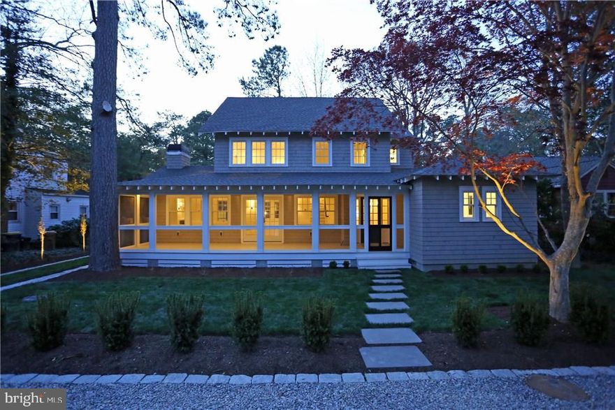 TOTAL RENOVATION and sensitive expansion updates a circa 1926 Pines Cottage for today's lifestyle. The main floor features a spacious open plan with reclaimed white oak floors and walls of new Andersen windows. French doors open to a 35' screened porch. A butlers pantry links the media room to the large kitchen with honed Carrara Marble counters and a built-in banquette. A laundry room, powder room and Private Master Suite complete this level. The second floor features a spacious Master Bedroom plus two additional bedrooms, each with its own bath. The oversized 75x100 lot boasts a new heated concrete swimming pool w/ bluestone coping and separate pool house/guest suite. Extensive landscaping and lighting provide for private and tranquil outdoor living. The Atlantic Ocean is 1.5 blocks away and the shops and restaurants of Rehoboth Avenue just a short walk--if you can tear yourself away from this private oasis. Summer rental of $120,000.