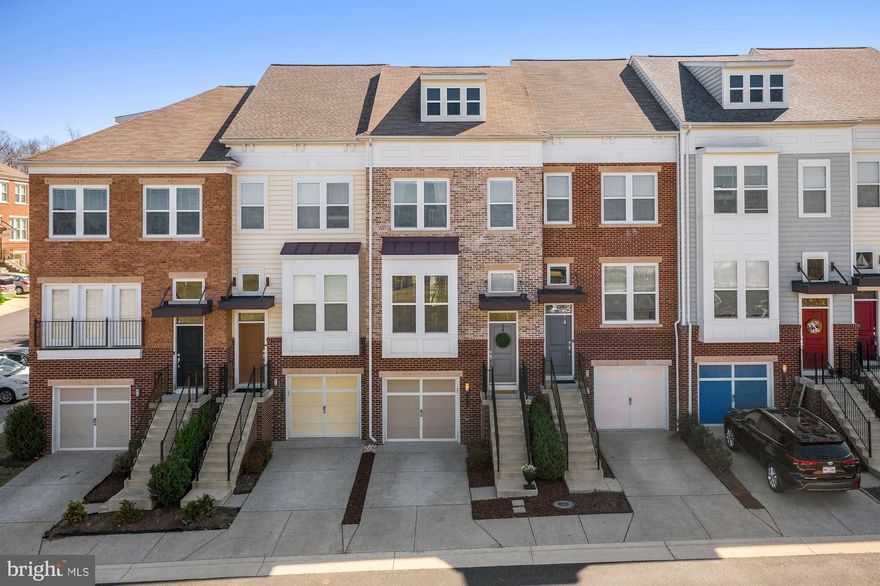 Gorgeous  and lovingly maintained 3 level townhouse  in Brambleton. Step into a home that you will want to make your own with hardwoods on main level,  professional paint, and beautiful touches. Great views await you from the main living area. Entertainers kitchen with island has room for an eat-in and walks out to the rear deck where you can enjoy grilling all year round.  Relax in the owners  suite bath with soaking tub and a separate shower.  The other two bedrooms are on the upper level and share a full bath. Take in a good movie or game in the spacious family/rec room on the lower level with a half bath and door-wall to the fenced in  yard and patio. Excellent location and so close to the Brambleton Town Center with awesome dining, shopping, library and recreation.  Fabulous community, schools and commuting options. This is a lovely home that will not last long!