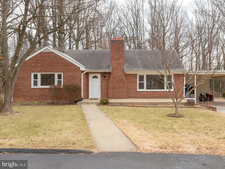 Beautifully updated single family all Brick custom home with almost half acre private level lot.  Newer kitchen, granite, appliances, two full bathroom completely updated, new HVAC and water heater.  Two rooms in basement and updated full bathroom, newer carpet in basement and large laundry room.  Freshly stained hardwood floor on the 1st level.  Large carport 35x30 with storage shed.  No HOA.  No HOA,