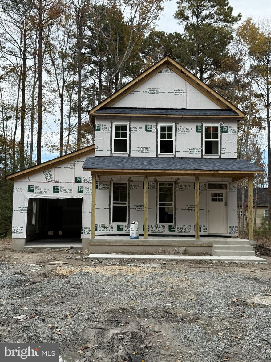 Discover the promise of your future home in the charming Placid Bay community, where this stunning Colonial-style residence is poised to become a sanctuary of comfort and style. With construction set to be completed in 2026, this new build offers three spacious bedrooms and two and a half bathrooms. The open layout invites natural light to flow through, creating a warm and welcoming atmosphere. Imagine cozy evenings in your living room or entertaining friends in the heart of your new home. The exterior features durable vinyl siding, ensuring both aesthetic appeal and low maintenance. An attached garage provides convenient access and ample storage, making daily life a breeze. The level lot offers plenty of outdoor space for gardening, play, or simply enjoying the fresh air. Embrace the opportunity to create lasting memories in a home that reflects your personal style and needs. Don't miss out on this chance to invest in a bright future in Placid Bay! Agent related to owner. Taxes and lot size are estimated.