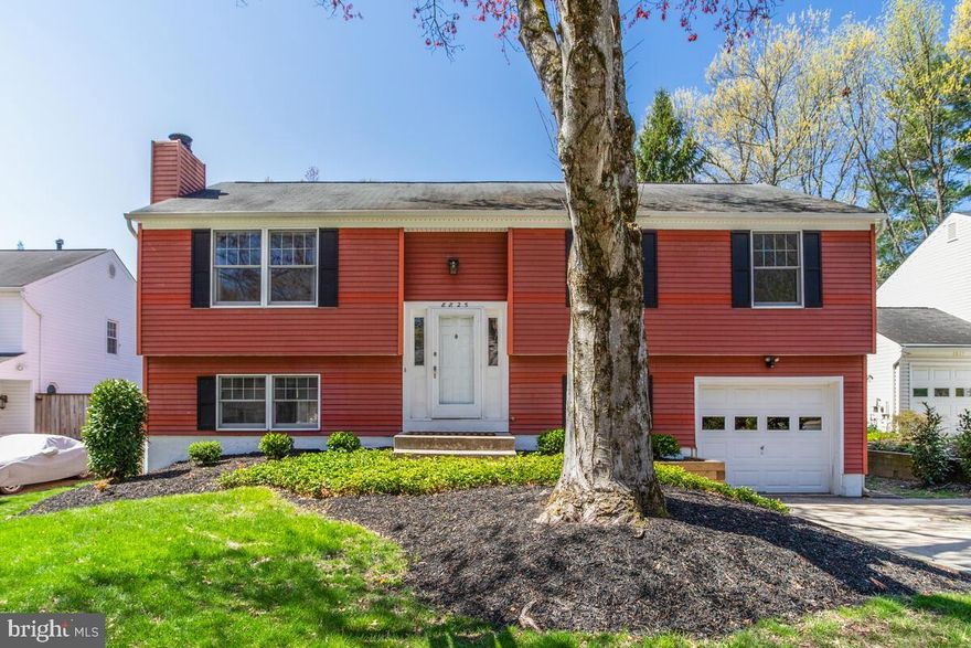 Get ready to tour this GREAT home (and the yard is a stunner too!!) This one will be easy to move right into & start enjoying living on a cul de sac street with easy access to Columbia pathways &  tot lots,  a quick stroll down to Jackson Pond + loads of other great local amenities just in time for Spring & Summer fun. Rich hardwood flooring stretches across the entire main level with open living & dining rooms with soaring cathedral ceilings; eat in kitchen with French doors out to the relaxing screened porch with commanding views of the flat rear yard; three bedrooms & two updated baths on this level too. Lower level offers a 4th bedroom (also could be a great at home office space), a full bath, family room with cozy wood burning fireplace & oversized sliding glass door to another great outdoor living option - a private ground level deck. Your very own full sized washer/dryer + access to the oversized garage is on this level as well. This is a home packed with value that you will be proud to own for years to come.