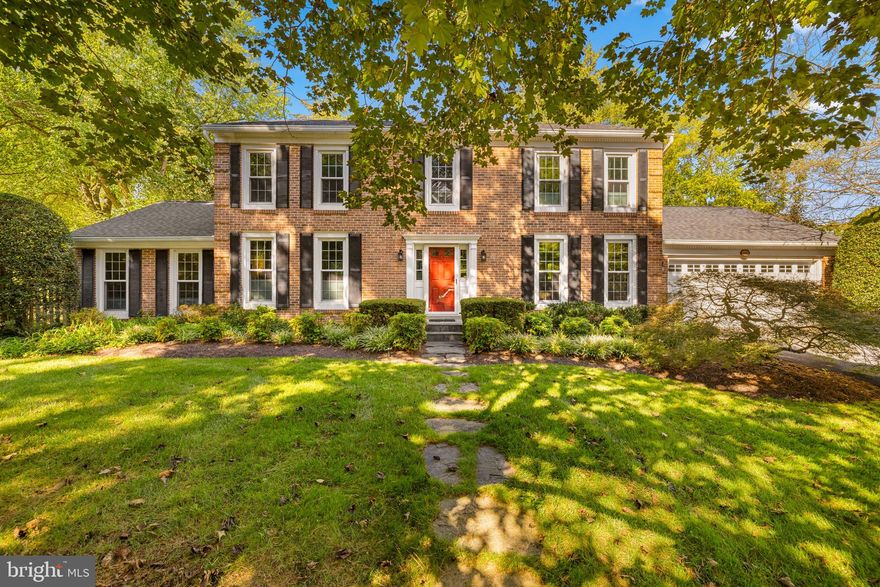Nestled on a quiet cul-de-sac, this handsome brick colonial offers classic charm, modern updates, and a large fenced backyard ideal for entertaining and playing. Step into the welcoming two-story foyer flanked by formal living and dining rooms. The light-filled sunroom features walls of windows—including a large bay window—a full bath, closet, and direct access to the backyard, making it a perfect option for a main-level bedroom or home office. The inviting family room includes a wood-burning fireplace framed by two sets of French doors that open to a spacious deck overlooking the backyard. The recently renovated kitchen boasts a breakfast bar, abundant cabinetry, and serene views of the backyard. Adjoining the kitchen is a cheerful breakfast nook with a built-in lighted hutch and a walk-in pantry. A two-car garage with new doors completes the main level. The floor plan provides exceptional flow for both everyday living and entertaining, indoors and out. Upstairs, the spacious primary suite features a walk-in closet with a custom California Closet system and a bright en suite bath with a skylight. Three additional bedrooms, a renovated hall bath, and a linen closet complete this level. The lower level offers a versatile recreation room with luxury vinyl flooring, a powder room, and a large storage/laundry area. This colonial sits handsomely on beautifully landscaped lot with a huge totally fenced backyard and an expansive private deck off the family room. Ranleigh is a sought-after enclave of twenty homes just one light to Washington DC. This home offers a rare combination of privacy, space and location - just minutes to Tysons, downtown McLean, downtown D.C. and Reagan National Airport. Also, just minutes to Turkey Run National Park and Scotts Run Park for hiking to the Potomac River and Chain Bridge and the Canal for hiking and bike riding to D.C. (See the extensive list of upgrades in the document section).