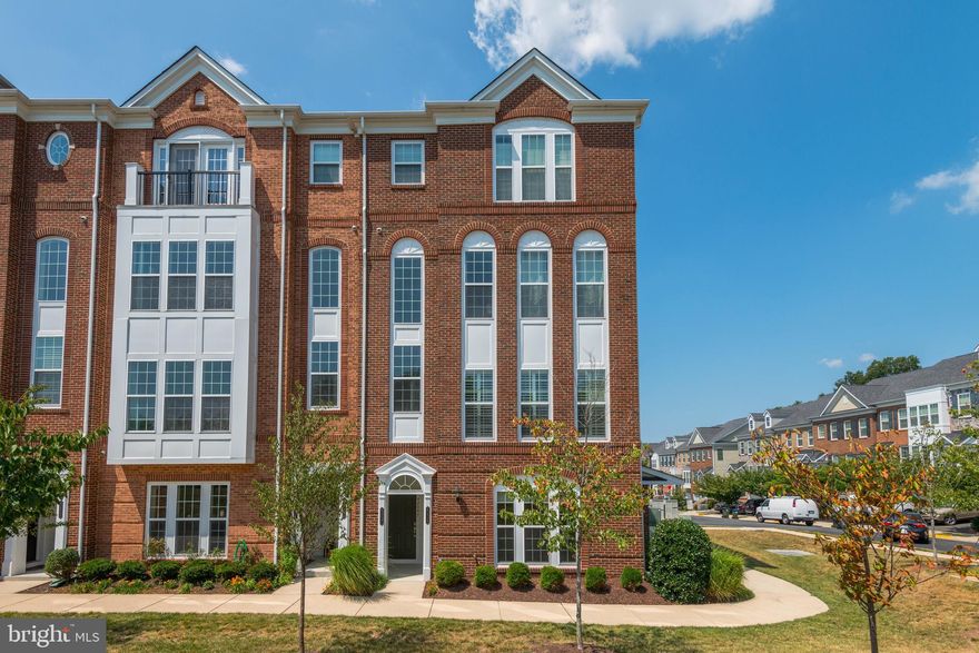 End home w/additional large side windows overlooking the common area park and gorgeous mountain views in the distance *  Loaded w/tons of deluxe upgrades * TH style, 2 Level stacked Lower Condo  * Attached 1 Car Rear Garage w/ Opener * 3 Spacious Bedrooms & 2 Full baths on second level * Wood Floors all thru Main Level * Blinds * Off-white cabinets, whirlpool SS appliances. granite counters, tile backsplash * Large Center Island * Recessed Lights * Large master suite W/stunning views and master bathroom suite with upgraded tile and walk-in closet. Walk-In-Closet in Master Bedroom * Nice Shower in Master Bath * Upper-level Laundry * Ample car parking spaces along the street for guests * Condo  located right across the street from the open park area * Walk able to Goose Creek Shops to Dulles Landing Shops * Close to Shopping, Medical, Library, Restaurants, Retail Stores and much more * Water & Sewer included in Condo Fee * Quick access to major roads - Belmont Ridge Rd, Sycolin Rd,  267 Green way/Toll. Close to Dulles International Airport * Excellence in style, function & locationLess than a mile to exit 4 on the Greenway and only a couple of miles to route 7 and Leesburg access by Sycolin Road.