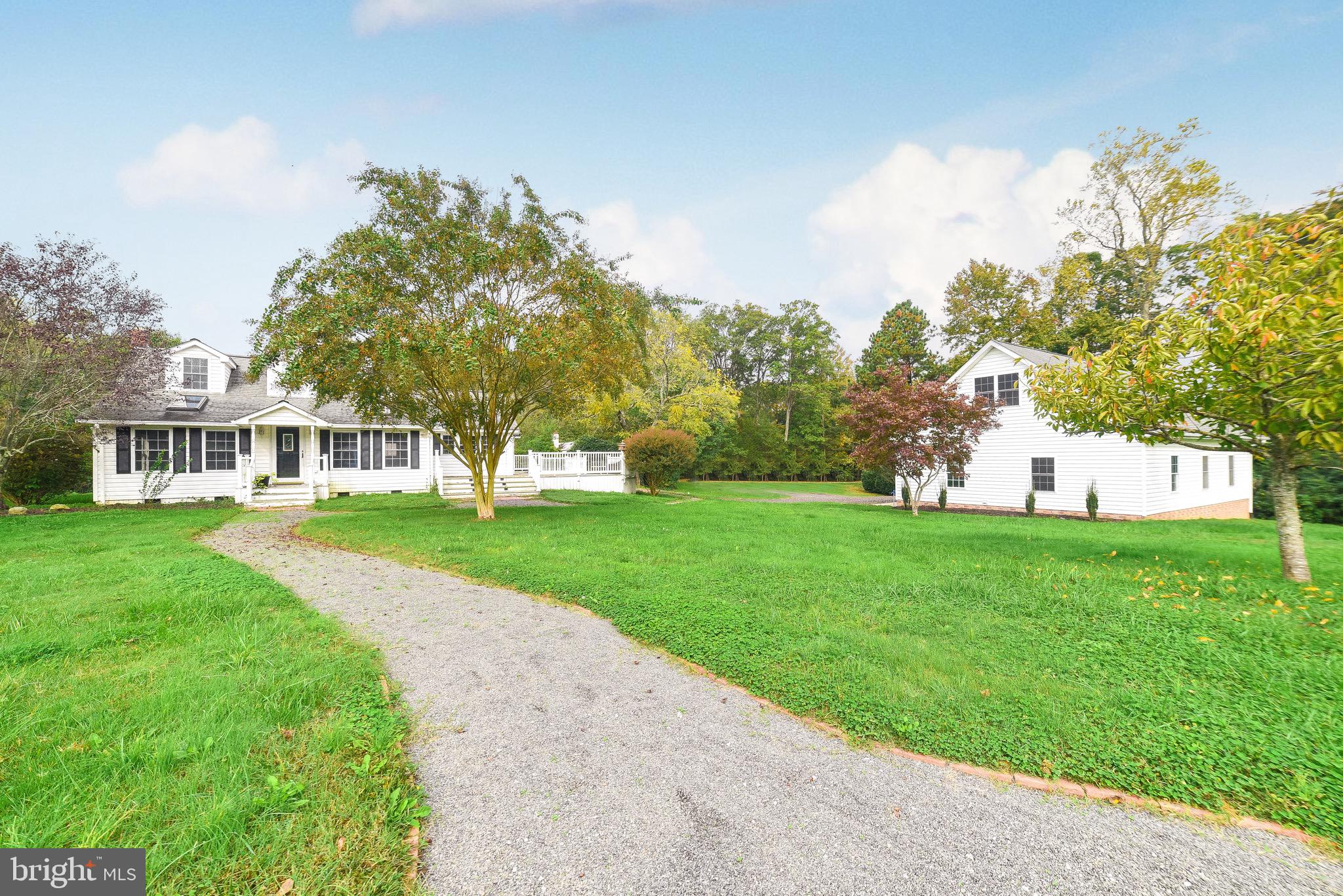 This is the one! If you are looking for privacy, storage, a beautiful setting, a large detached garage, out buildings for storage, a gazebo for outdoor picnics then look no further! This unique home is above average! Once you are here you will feel right at home! With over three acres and picturesque views, you wouldn't mind being quarantined! A short walk will take you to the community pond with a nature trail. Our price is for this lovely home is AS-IS.