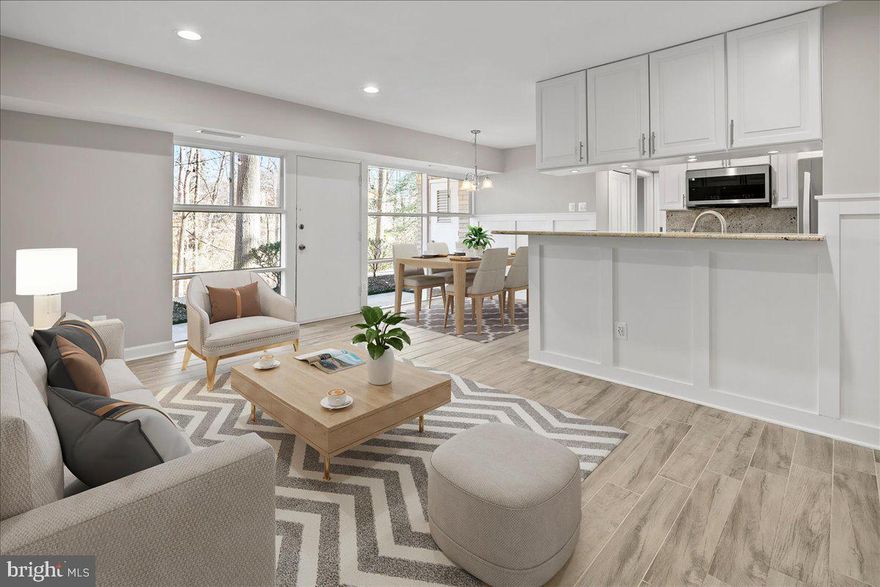 Welcome to this bright and beautifully updated 3-bedroom condo, offering a wonderful blend of comfort, privacy, and convenience. A rare feature in condo living — this unit boasts its own private entrance. Expansive windows fill the living space with natural light and an airy, open feel. Step outside through your private entrance to a large patio, perfect for relaxing or entertaining — a peaceful retreat overlooking open park space that you'll love coming home to every day.

New AC installed! The open-concept layout flows effortlessly into the well-maintained kitchen, featuring granite countertops, newer appliances, and a breakfast bar. Fresh paint and updated flooring run throughout the entire unit, while the spacious primary suite includes a walk-in closet. The updated bathroom features contemporary tile, a stylish vanity, and modern fixtures. Additional highlights include a large, secure storage unit on the basement level — ideal for bikes and more — plus access to a clean laundry facility and a community pool.

Condo fees cover gas, water, trash, common area maintenance, and pool — making for easy, low-maintenance living!

This property qualifies for 100% financing AND a $5,000 closing cost credit through a local mortgage lender — inquire for details on this fantastic program!

Located in the heart of Annandale, you're less than a mile from parks, trails, shops, and a variety of great restaurants. With easy access to I-495, Little River Turnpike, and major commuter routes, convenience truly meets comfort in this must-see home!