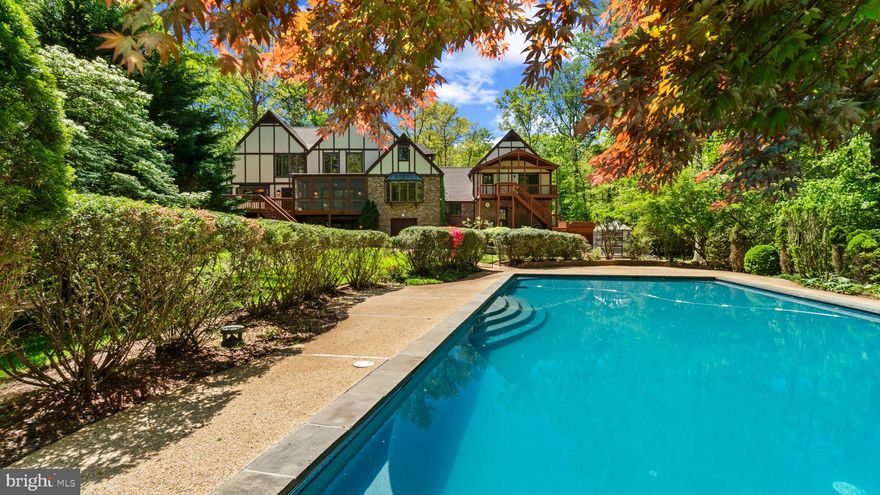 Live your best life in this glamorous Huntington Woods estate home.  With over 8000 square feet of interior space, 7 bedrooms (four with ensuite bathrooms), three kitchens and a separate guest/in-law apartment above the garage, there will never be issues with respect to personal privacy.  The legions of exterior living space include lush, mature grounds with specimen trees and flowers, a breathtaking 50' x 25' gunite and tile heated pool, flagstone patio with private therapy spa by Hot Springs (room for 8), a two-tiered stacked stone pond, three decks, a large, screened porch and front covered patio.  No expense has been spared on the interior, where upon entry you will be dazzled by the stunning Schonbek crystal chandelier, honed marble floors with wide oak plank border, an elegant, curved staircase and hand-painted wall surround.  The family room features a beautiful, custom stone floor-to-ceiling wood fireplace (17' ceiling), hand hewn pine beam mantel, white oak floors and atrium doors that lead to the screened porch overlooking the pool and manicured grounds.  In the main kitchen (one of three full kitchens in the home) the cook will be pleased with the new Kitchen Aid 48" counter-depth stainless steel refrigerator, the Wolfe 6-burner gas range, plus two GE downdraft burner/grills and the GE Profile double oven with microwave above and warming drawer below.  Storage will never be an issue with countless base cabinets featuring roll-out drawers, swing-out appliance shelf and functional uppers, including spice racks and leaded/stained glass doors.    Completing the main floor is a huge office with lovely views (bay window) overlooking the grounds and pool, a very large formal dining room and living room that feature random width white oak floors, Italian marble fireplace hearth/surround with hand carved mantle, custom wainscoting/chair rail combo and a first floor bedroom with large double closets and attached full bathroom.  The second floor primary bedroom includes a spacious sitting area with wood-burning fireplace and skylights, cedar closet, two walk-in closets and two additional closets.  The custom honed marble/Italian glass bathroom includes a roll-in shower with bubble glass walls/door, high-end Victorian soaking tub, two vanities, Kohler cabinetry and Lea and Perrin fixtures.  Completing the second floor are two additional en-suite bedrooms with abundant closet space and as throughout the rest of the home, solid oak doors and custom shelving.  There is a 900+ square foot apartment over the garage that is spacious, private and fully equipped with kitchen, full bathroom, two bedrooms and open living area.  The lower level is complete with yet a third full kitchen, living area with three sets of atrium doors leading out to the flagstone patio, a full bathroom, office space, workout room and tons of additional storage.    Come and luxuriate in this private, pristine property with unparalleled outdoor spaces and call it your own.