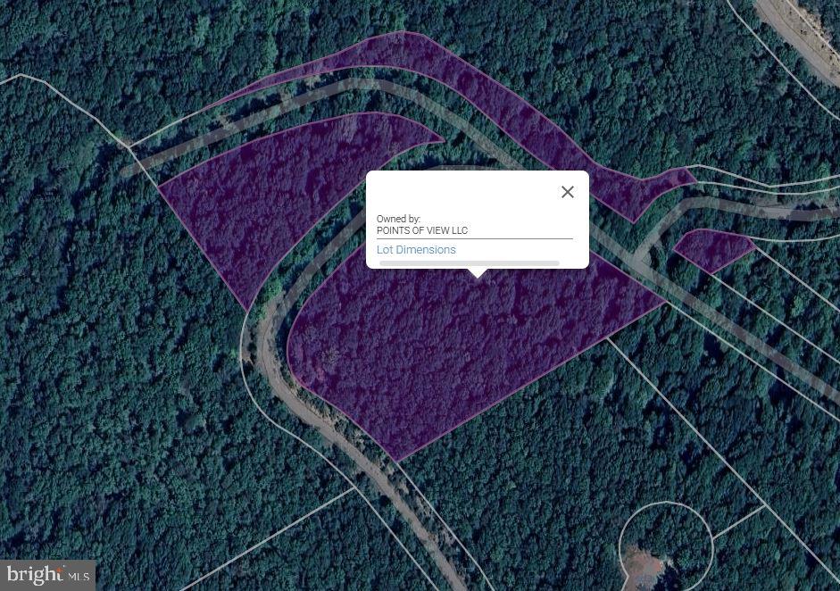 This lush wooded lot measure 9.66 acres. What an amazing price for all of that space. Come build your dream home away from the hustle and bustle. This property could also be used for a second home or an AirBNB. There's a ton of potential and plenty of acreage. Call for more info today!