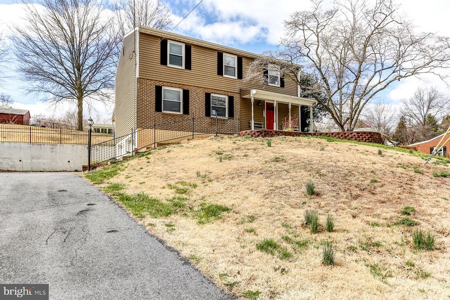 This spacious 4-bedroom, 2.5-bath home sits on nearly half an acre and offers a blend of comfort and convenience. The updated kitchen flows into the dining area, which opens to a covered patio overlooking the fenced backyard. An in-ground pool with brick pavers is ready for summer enjoyment.  With a two-car garage, an oversized driveway, and easy access to I-283, the PA Turnpike, and local shopping, this home is both practical and inviting. Schedule your showing today!