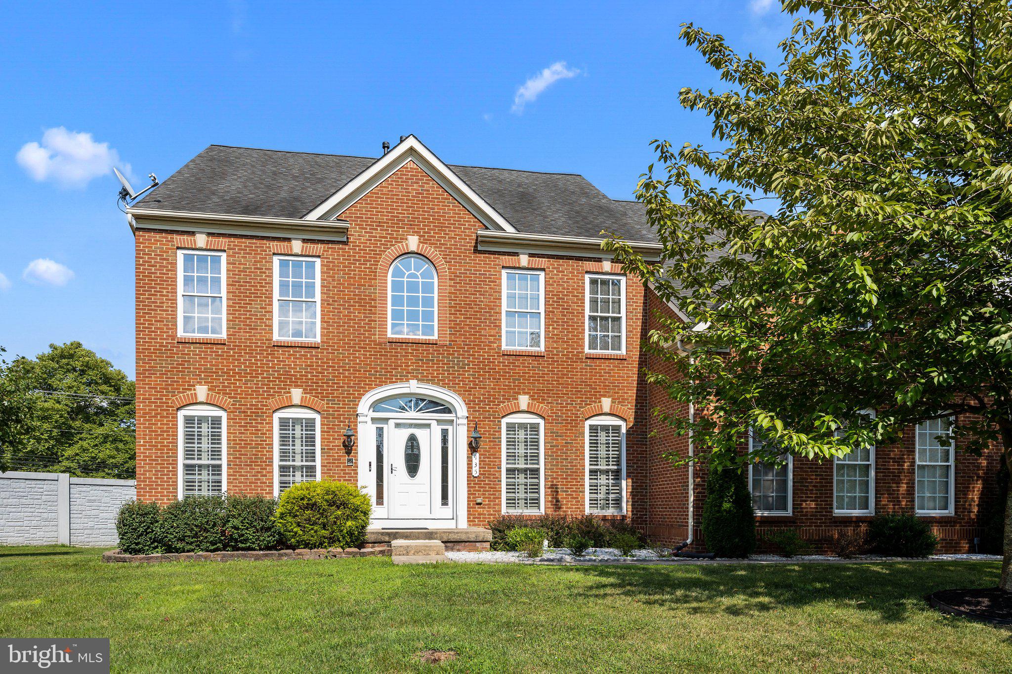 Welcome to 135 Robertson Rd, a beautiful brick front colonial located on a quiet cul-de-sac. Enter into the Foyer, where gorgeous hardwood floors lead you into the Living Room accented by lovely plantation shutters. The Dining Room features a tray ceiling and Butler Pantry to the Kitchen, perfect for entertaining. The gourmet Kitchen is a chef’s dream with a large island, stainless steel appliances, granite countertops, and abundant cabinetry. Off the Kitchen is the Sunroom, which overlooks the peaceful backyard and the Family Room is a great spot to relax by the gas fireplace. An Office tucked away next to the Powder Room, while the Laundry Room is conveniently located off the Kitchen and connects to the 2-car garage. Walk up the stairs and into the desirable Primary Bedroom Suite, featuring a tray ceiling and plenty of sunlight. The Primary bathroom is an oasis with a glass shower, soaking tub, 2 vanity and spacious walk-in closet. Down the hall you’ll find 3 bedrooms, one with an en suite bathroom, and the hall bath. The fully finished basement offers a versatile space perfect for a home theater or recreational area and is plumbed for a wet bar. This lower level also includes a full bathroom, extra storage options and walk-out to the backyard. Outside, the well-maintained backyard provides a peaceful retreat for outdoor enjoyment. Located in a desirable neighborhood with convenient access to local amenities, schools, and parks, this home is designed for both relaxation and entertaining. Schedule your appointment today.
