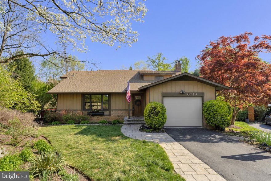 Welcome to 6719 Pine Creek Court, a spacious home with 3,000 sq. ft. located on a quiet cul-de-sac in the heart of McLean. You will be impressed with all the recent updates, including fresh paint throughout, new lighting, refreshed bathrooms  and recently replaced HVAC (2020).  Offering four bedrooms, three and a half bathrooms, and a one-car garage, this residence provides a functional layout across three levels and is totally move-in ready!
The main level features a large living room with tall picture windows, and a dining room with direct access to the expansive rear deck. The adjacent family room has a beamed ceiling and includes a wood-burning fireplace, and a second walkout to the deck—ideal for indoor-outdoor living. The kitchen is equipped with an island cooktop and a breakfast area.
Upstairs, the primary bedroom includes an en-suite bath with a tub/shower. Two additional bedrooms and a full hall bath complete the upper level.
The walk-out lower level offers a large recreation room with a second wood-burning fireplace, an additional bedroom, a newly renovated full bath, and a separate laundry room.
Enjoy proximity to top-rated schools, local parks, shopping, dining, and Metro access—all within minutes. This home offers a peaceful setting with everyday accessibility in a central McLean location.