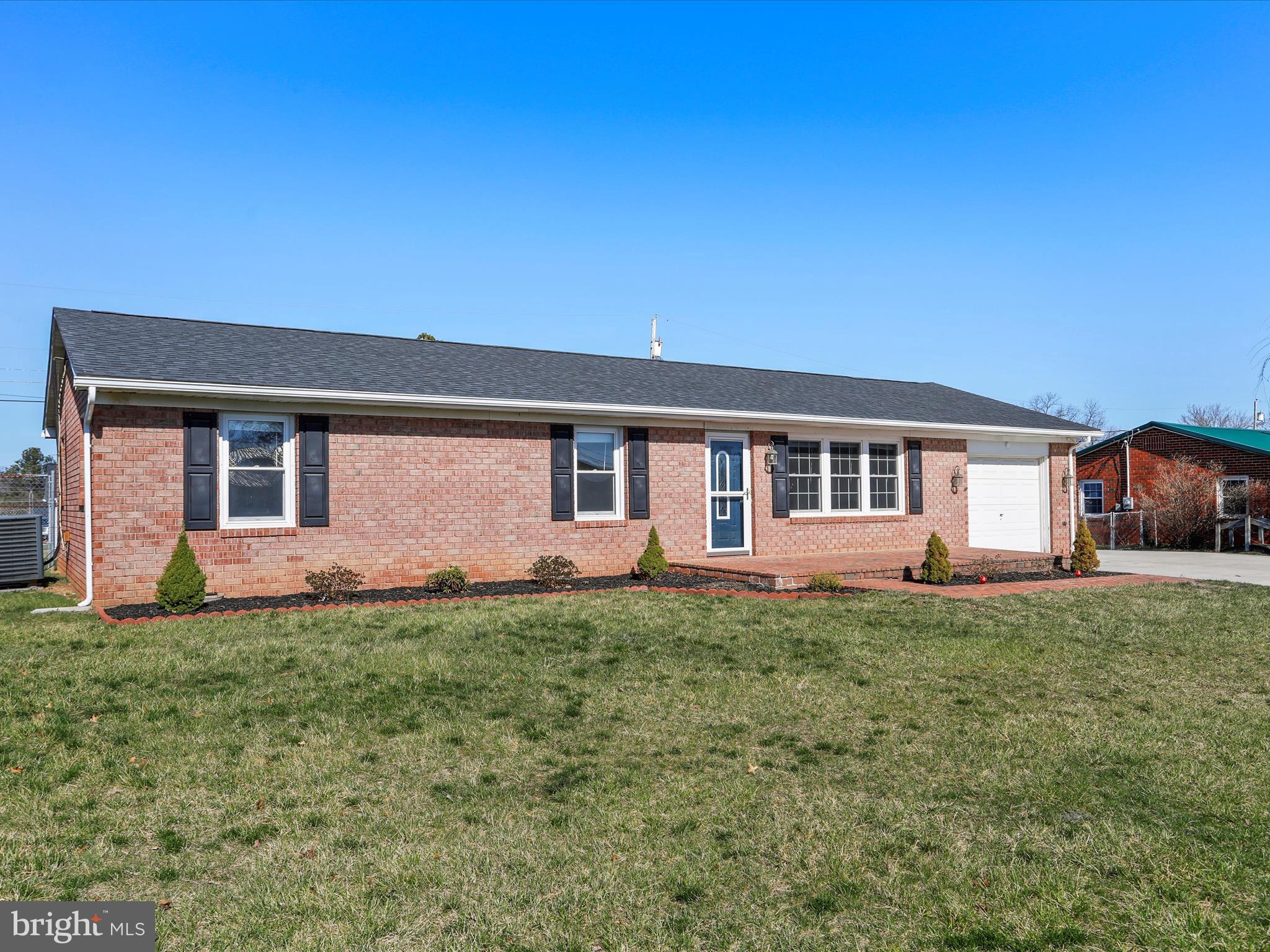 Look No Further! You ARE Home! Welcome to 565 Richard Street! This Gem is situated near everything, to include shopping, restaurants, movies, schools, the MARC train, and Interstate 81. This beautiful 3 Bedroom 2 full bath home is in a Quaint little neighborhood with No HOA and state maintained roads. The beautiful home boasts 3 bedrooms and 2 full baths. The master bedroom includes and XL walk in closet and bathroom and lots of privacy. Once inside you will be welcomed by an open living room into a VERY SPACIOUS KITCHEN, with lots of counter space as well as cabinet space all to include Granite countertops, upgraded cabinets, tile floor and updated lighting. Right off the kitchen you have a bonus Laundry area as well as storage area which opens to the covered back porch and fantastic fenced yard. The back porch is perfect for barbeques or just watching the dogs play in the back yard or coffee sipping! At this home, you have extra room in the driveway for that camper, extra vehicles and better yet its concrete! Don't forget the garage space as well, it can be used for storage or part the car inside and protect it from the snow. Come check this one out before its gone. Home includes Newer Roof, newer HVAC System, stainless steel appliances, upgrades galore, and wonderful curb appeal.