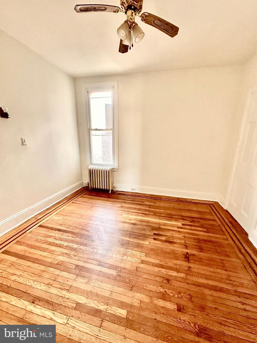 Bright and airy third floor, two bedroom apartment in the Nicetown-Tioga neighborhood of northwest Philadelphia available for immediate occupancy. Hardwood floors in living room and bedroom. Efficient kitchen with gas range. Refrigerator will be provided as well. Shared laundry will be installed in the basement. Cat friendly with no added pet fees. First, last and one month security due at lease signing. Credit over 650 required. Heat and water/sewer included in rent. Reach out for the video tour, showings and applications.