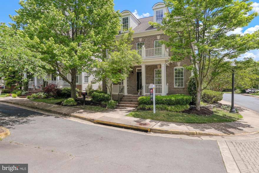 Brick front Community Model Home, built  by Christopher Co. Loaded with all available extras and upgrades. Custom molding and columns, 9-10 ft ceilings.  Gorgeous hardwood floors with inlaid carpet. Gourmet kitchen features 42" maple cabinets, granite counters, stainless steel appliances. 2 gas fireplaces, 2 zone gas heat, luxury master with garden bath. Freshly painted,  brand new carpets.  City's classic community with Charleston Style.  Walk to downtown Fairfax City and Shopping Centers. Minutes to metro, bus, I-495, I-66, GMU.