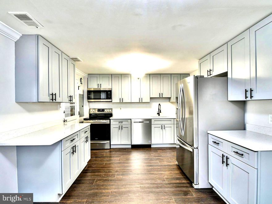 Buyer's financing fell through!!Please bring fully qualified clients only!!! Seller is offering a Home Warranty. This home could be yours for as little as 3% down with NO PMI!!! $10,000 closing help available. $25,000 closing assistance available for First Time Homebuyers! Move-IN Ready in Excellent condition For those who Prefer Not having "Too Much House"  Spacious New Kitchen, New Cabinets, Quartz Countertops, Stain Steal Appliances, Renovated Bathrooms, New Water Heater, Roof is 8 years Old, New flooring,  Harwood in Upper Level,  Large Driveway, Fresh Paint Throughout The House, Large Rear  Back Yard/ Back Porch Combination;  Great for Entertaining, Large Shed,  The Front Yard is Fenced as well,  off street parking. And, Guess What - NO HOA fees!! The Location is Undeniably Convenient. Close Woodmore Town Centre, Wegmans, Fedex Field, D.C., and Commuting is a Breeze with convenient transportation options close by, including Metro Train station, Metro Bus, and: I-495, I-295, and I-95. ALSO – There are Special Down Payment Assistance programs available (Ask Listing Agent).