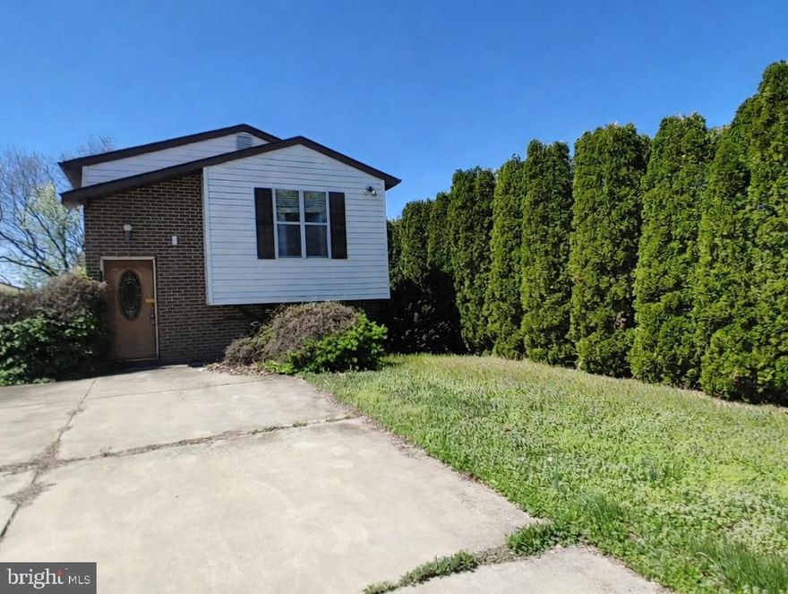 Discover this charming split foyer home nestled in the desirable Sunset Beach neighborhood, built in 1986. This detached residence features three spacious bedrooms and two full bathrooms, perfect for comfortable living. The fully finished basement offers additional space with both interior access and an outside entrance, ideal for entertaining or relaxation. Enjoy the serene surroundings with Stoney Creek just steps away, providing a picturesque backdrop for outdoor activities. The property boasts a well-maintained exterior with inviting deck and patio areas, perfect for enjoying warm evenings. An outbuilding adds extra storage or workspace options. Conveniently located near local amenities, this home offers easy access to shopping, dining, and recreational opportunities. With a driveway for parking and a peaceful creek view, this property combines comfort and convenience in a vibrant community. Don't miss the chance to make this delightful home your own!