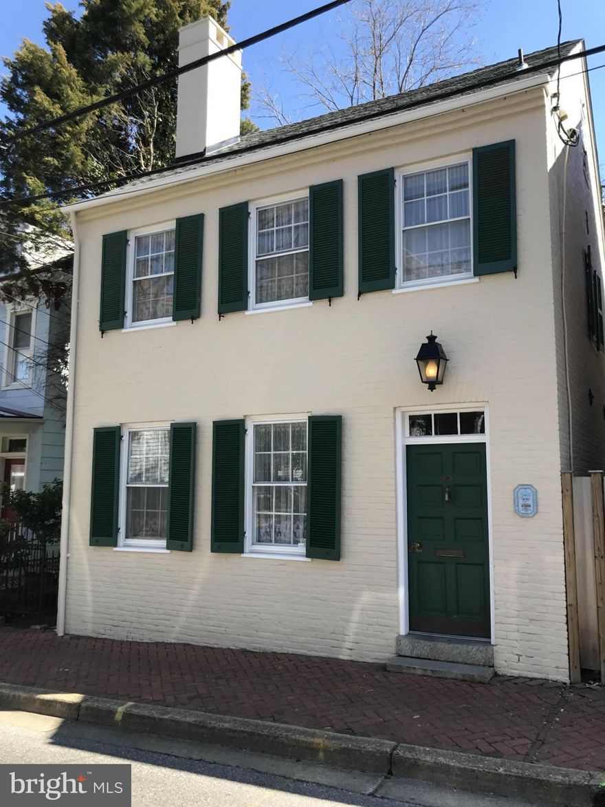 Beautifully restored 1832 Federal Period Home ideally located in the heart of Historic District & steps to City Dock, USNA and Downtown restaurants & shops and PRICED TO SELL. Gleaming pine hardwoods, plaster walls & many original mouldings and fireplaces. Gourmet Kitchen & stunning Great Room addition w/French Doors that open to fenced patio & garden. Newer Roof, masonry & exterior paint.