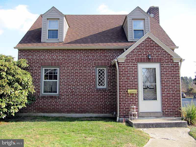 All brick home on spacious corner lot. Hardwood floorings, fireplace in living room and large detached garage. Plenty of room for parking, and convenient location.
