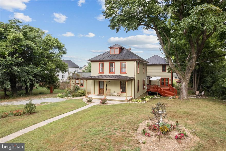 New Boiler, New Tankless H20 Heater, Fresh Exterior Paint, Renovated/Modern Kitchen+Baths+Laundry Room, Modern Plumbing and Electrical Systems.   This 1890’s colonial retains the character but everything has been updated!   Enjoy the custom kitchen, one-of-a-kind bathrooms, multiple indoor/outdoor gathering areas, and the huge modern addition!  The expansive 3 story addition was originally built as an art studio, approved for a home business.  The 1st floor is for creating and entertaining (with wet bar and ½ bath), while the top floor has 2 light-filled studios, a bedroom and full bath.   The walkout basement is heated with extra outlets, for even the messiest workshop.  
Outside, you’ll find multiple decks, patios, and sitting areas with perennial plantings, stone edging, and a full garden with she-shed!   The detached garage workshop has plenty of available power.  And don’t forget our 1st floor primary bedroom with private entrance and full bath.  The home is perfectly placed in quaint, small-town Berryville, walkable to everything!  Welcome home!!  All sizes approximate