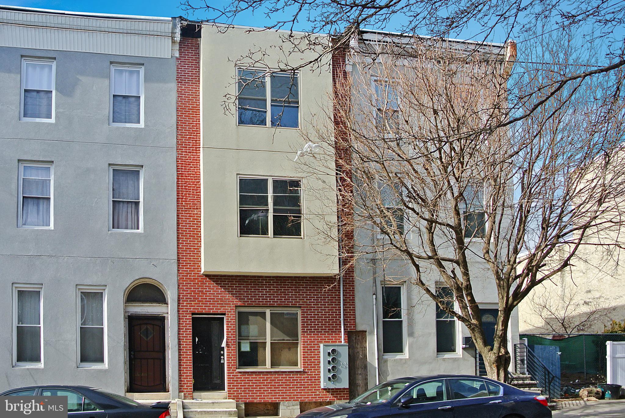 Seize the incredible opportunity to bring this project to completion! Already framed as a three-story duplex with brand-new windows installed, this property holds limitless potential. Nestled on a picturesque, tree-lined street and surrounded by beautifully renovated homes, the location is truly unbeatable. Its prime spot offers convenient access to public transportation and is just moments away from Temple University—an ideal setting for future residents. Don't let this gem slip away—schedule your showing today!
