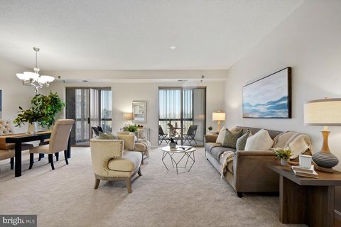 Photo of 3210 N Leisure World Boulevard #308, SILVER SPRING, MD 20906 (MLS # MDMC2208916)