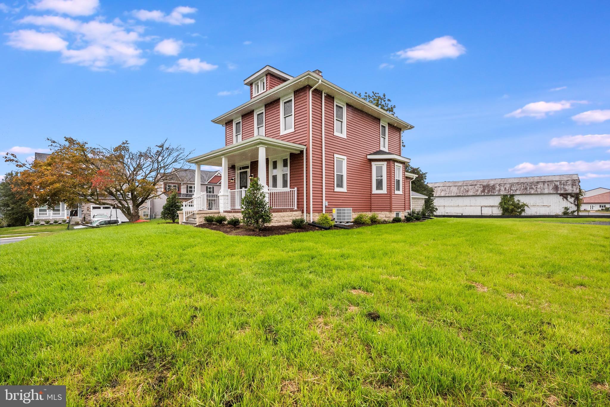 HOME IS THE CENTER PIECE OF THE COMMUNITY - MINIMUM CREDIT SCORE of 700 required.
Renovated Historic Home is the centerpiece of the beautiful New Community of HOMESTEAD, featuring Craftsman Style Homes. Enjoy the view overlooking the community and enjoy the constant breeze as this home is perched at the top of the community. Home has been updated to include a primary bedroom & bath, half bath on main level, and 1940's architectural features that are full of charm! Laundry is located on main level and unfinished basement for storage. This historic home is the showcase of the neighborhood reflecting on one of Anne Arundel County's oldest farms.