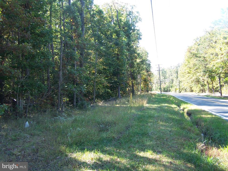 These lots are very difficult to develop.  After 4 contractors tried to work these lots  and couldn't make the numbers work.  It required lowering the price so these lots could be developed.  Over $1.5 million in development costs.  Fantastic Building lot in center of other high end homes. 5.10 Acres mostly beautiful trees. Slightly sloping lot.  Great for your forever home.