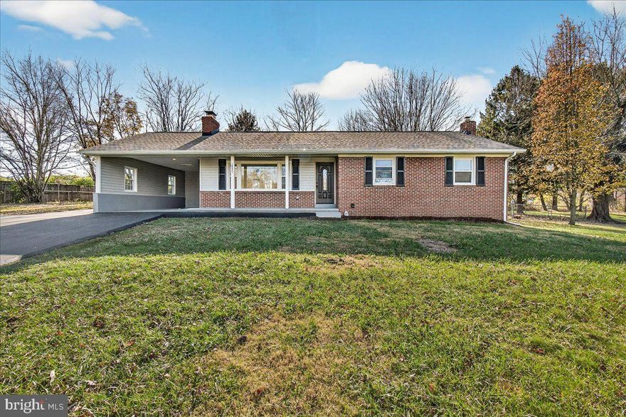 Welcome to 10821 Old National Pike in beautiful New Market!   This is an incredible opportunity to own a fully renovated home on over half an acre in the highly sought-after Oakdale School District—just one mile from historic downtown New Market.  No detail has been overlooked! All major systems are new, including HVAC, LVP flooring, recessed lighting, hot water heater—plus the roof and windows were replaced within the last few years. This brick-front, two-level rancher truly checks all the boxes for easy main-level living.  Inside, you’ll find a bright and spacious floor plan featuring:  updated kitchen with granite countertops, stainless steel appliances, and a custom island, separate dining room with walkout to the enclosed carport, cozy living room accented by a white brick wood-burning fireplace, primary bedroom suite on the main level with private half bath, two additional bedrooms sharing an updated full hall bath.  The fully finished lower level offers exceptional flexibility with:  A second oversized primary suite complete with full bath, sitting area, and ample closet space, a generous recreation room, dedicated laundry room, walk-up access to the backyard patio, outside, enjoy the recently added one-car enclosed carport, a freshly blacktopped driveway with additional parking, and a spacious yard perfect for relaxing or entertaining. This property blends the tranquility of country living with unbeatable convenience.  Nothing to do but move right in!  Close to commuter routes, shopping, dining, schools, employment centers, medical facilities, recreation, and places of worship. No city taxes and no HOA!  Come take a look!