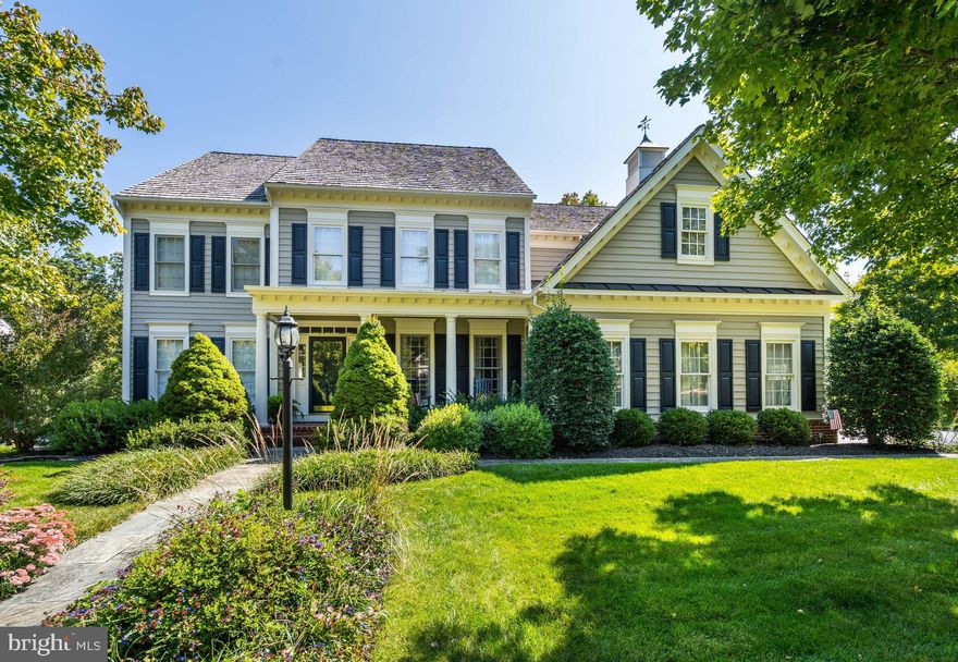 Tucked into the ridge-line community of Woodlea Hills, 1181 Hawling Place offers a rare combination of privacy, space, and convenience in one of Leesburg’s most established settings. Set on a large lot with elevated surroundings and a quiet, refined neighborhood feel, this home delivers the benefits of the Woodlea Manor HOA—including pool, tennis, and neighborhood amenities—while still feeling tucked away in an upscale residential enclave.

Built by Weatherburne, this home has been thoughtfully improved over the years with extensive updates and meaningful renovations that reflect long-term care and pride of ownership. Inside, hardwood floors span both the main and upper levels, while the layout offers the blend of openness and defined spaces that buyers often seek. The main-level office is enhanced by built-in bookcases, creating an ideal space for working from home, reading, or quiet retreat.

At the center of the home is a gourmet kitchen with a large center island, designed to function equally well for everyday living and entertaining. Custom cabinetry, professional appliances, a wine cooler, and a trimmed ceiling give the space both function and architectural character. The adjoining family room features a brick fireplace with a gas insert, creating a warm and inviting setting for everyday living. Additional major improvements over time include updated baths, roof replacement, new HVAC systems, a Navien tankless water heater, and hardwood flooring throughout the upper level, giving buyers confidence that the home has been consistently maintained and meaningfully updated.

Upstairs, the primary suite offers exceptional scale, including a large bedroom with a separate sitting room for a private lounge, reading area, or exercise space. The fully renovated primary bath is a true highlight, finished to a high standard with an upscale feel that sets it apart from the typical renovation. One of the secondary bedrooms features its own en suite bath, while the remaining two guest bedrooms share a Jack and Jill bathroom, offering a practical and well-designed upper-level layout.

The walkout lower level adds substantial living space and an abundance of natural light, creating a bright and inviting extension of the home. A large recreation room is complemented by a pellet stove, a full wet bar with wine cooler, a half bath, and direct walkout access, making the space especially well suited for entertaining, relaxing, or extended gatherings.

Outdoor living has also been carefully expanded with a deck, screened porch, rear patio, round backyard patio, stone walls, walkways, and mature landscaping that help the property feel established, private, and connected to its setting.

The location offers easy access to everything that makes Leesburg so desirable—from the restaurants, coffee shops, and boutiques of Historic Downtown Leesburg to nearby commuter routes including the Dulles Greenway and Route 7.