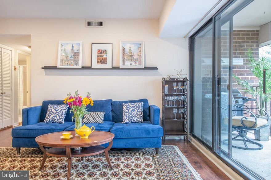 Spacious one bedroom floor plan located just a 1/2 mile from King Street Metro in Old Town! This unique condo is a top floor unit overlooking the Masonic Temple and trees! Fully renovated in 2016 with updates to include: installation of dark laminate flooring and recessed lighting throughout, marble backsplash, under cabinet lighting in kitchen, and a new washer. Enjoy stainless steel appliances, granite countertops, a large balcony, and eat-in kitchen! Laundry can be found in-unit with a full size washer and dryer and plenty of storage. The master bedroom is very large and includes one walk-in closet, as well as an additional 8+ foot standard closet. Assigned parking is right outside your door, with 2 additional long-term guest parking spaces offered. Additional shared storage in the basement, condo fee includes all utilities except electricity. Walk to the Metro, Whole Foods, and shops and restaurants on King Street! This is one of the largest 1 bedrooms currently being offered in 22314 under $300K, don't miss out!