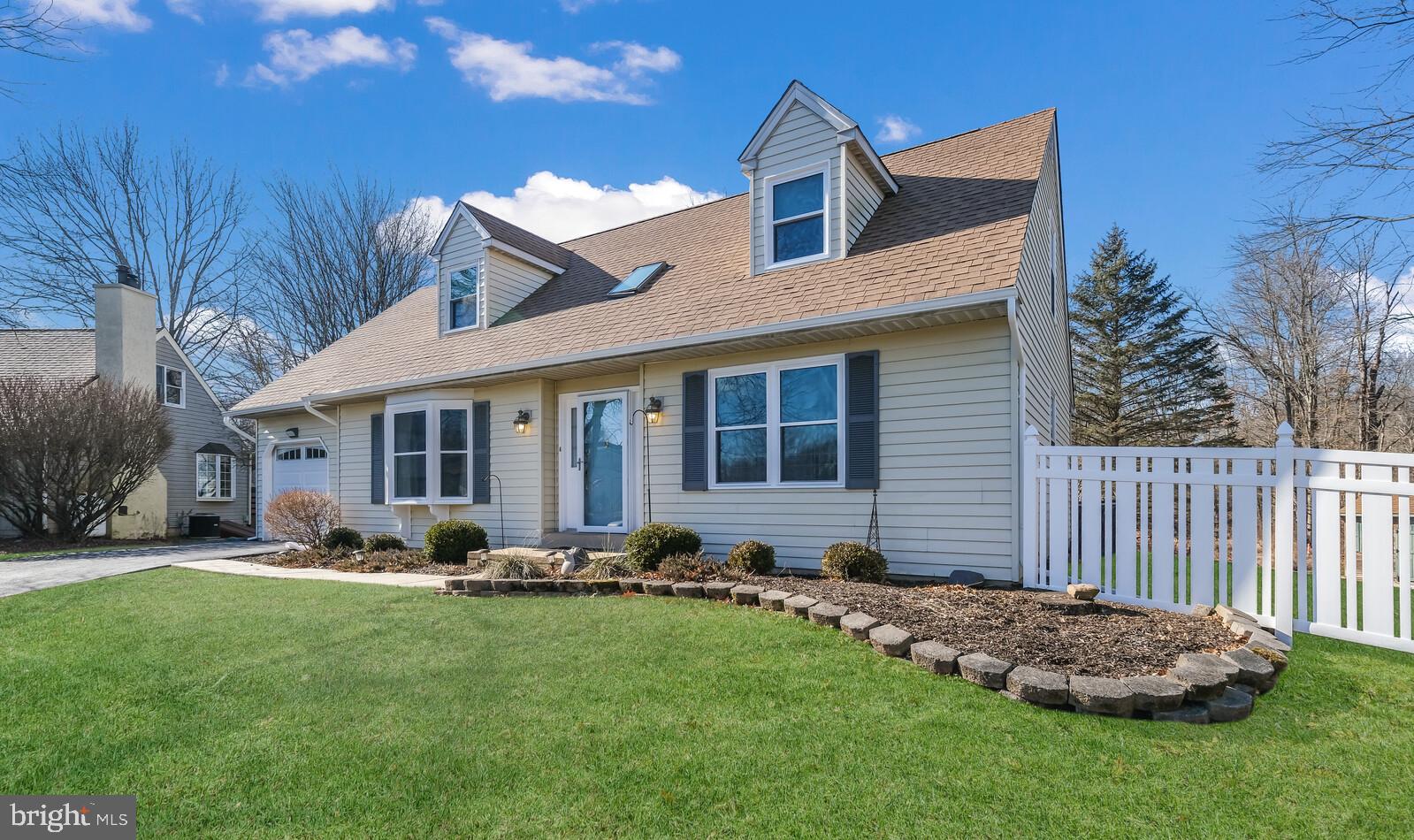 A delightful and sun-filled raised Cape Cod style single family home with fresh paint, new windows and new carpet: on a cul-de-sac on a third of an acre. First floor features 2-story foyer with skylight; large living room; full kitchen with brand new appliances; dining area with sliding glass door access to a 1,000sq.ft custom deck spanning the rear of the home overlooking wooded open space. Rounding out the first floor is a full bathroom, family room, and laundry room with inside access to 1 car garage. Second floor features owners bedroom with custom closets and access to floored room over the garage for storage; full bathroom with linen closet, 2 additional bedrooms complete the upstairs. There is a full unfinished basement and ample storage space. Property adjacent to protected open space that is wooded and a stones throw from the hike and bike trail. Conveniently located to shopping, restaurants, public transportation, major roadways, Doylestown Hospital and Award Winning, Blue Ribbon Central Bucks School District.