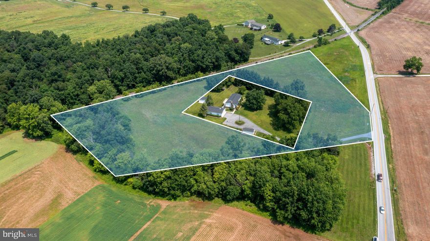 4.92 flat, unimproved acres in Taneytown, MD! Cannot be mowed until September due to a state program.