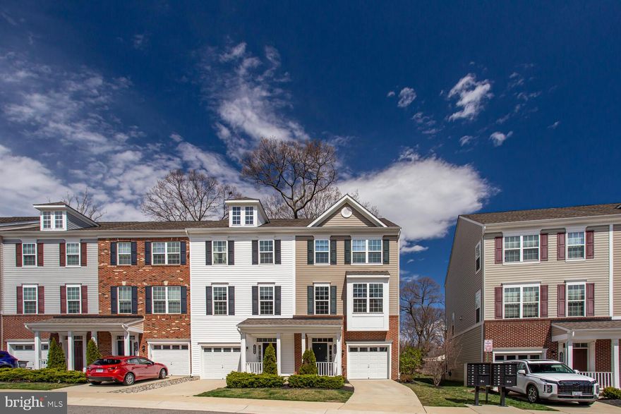 This a stunning  one car garage, end-unit townhome style condo is the gem of sought after Featherstone Station! Features include an open main level floor plan, beautiful wide LVP flooring and  LED smart lighting, Smart thermostat and security system! The gourmet kitchen is an entertainers dream with a massive island with seating for 4 comfortably, beautiful quartz countertops, stainless steel appliances, pendant lighting and is flanked by a lovely dining area on one side and a spacious living/entertainment room perfect for game night or a cozy night in! Upstairs you will find two expansive bedrooms suite with large walk-in closet and en suite bath with dual vanity. Finished walk-out basement with a flex room (3rd bedroom/media/rec) and full bathroom offering income potential. Minutes to VRE, major commuting routes, shopping and dining.Featherstone Station is a sought-after community known for its well-maintained surroundings and accessibility. Condo fee covers Water, sewer, yard maintenance,damages anything outside of the house(roof, siding and etc.), snow removal, dog pooper scooper service, community center and Gym. The  location offers proximity to local amenities, shopping centers, dining options, and major transportation routes, making daily commutes and errands straightforward. Don't miss this beautiful home!