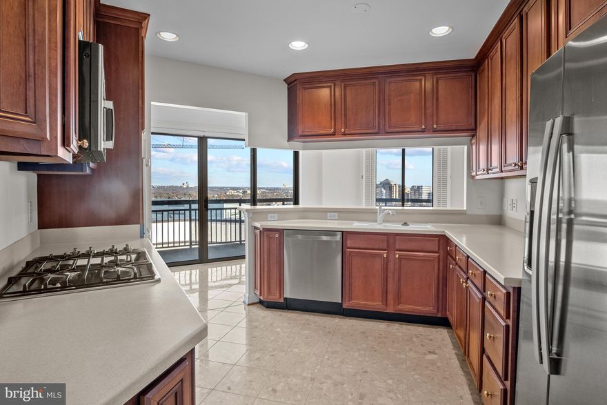 Luxurious 2 bedroom plus den, 2.5 bath, 1,646 sq ft Penthouse condo at Virginia Square Condominium, across the street from Virginia Square Metro.   This condo unit, located on the 16th (top) floor, has beautiful wraparound views including views of the D.C. Monuments and National Cathedral.   This unique residence includes  a primary bedroom and bath, 2nd bedroom and 2nd bath, a powder room, marble flooring throughout, and new stainless steel appliances in the gourmet kitchen.  2 garage parking spaces (G1-107, G1-114) come with this unit and there is an additional storage closet on the garage level also.  Living room has a gas fireplace,  washer/dryer are in the unit, and there is a large private balcony.  Virginia Square Condominium is a wonderful building, with on site management, outdoor pool, game room and fitness center.  Property is being managed by Richey Property Management.  Contact listing agent for application procedure.  Tenant occupied; Photos are when property was vacant.