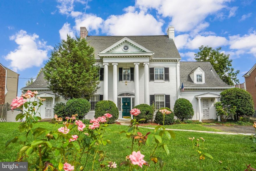 Incredible, stately & spacious, brick, Georgian Federal with slate roof in PRIME LOCATION on historic Arlington Ridge Rd. Combined with an adjoining OutLot (which conveys with sale), this grand home sits on over ½ acre and offers phenomenal potential! Over 5000 sq ft on 4 levels, including an interior staircase to a large attic, which may be finished into another great living area! Private balconies and a deck grace the back while gorgeous Queen Elizabeth Rose bushes line the front fence. The main level features hardwood floors, as well as tile in the foyer and kitchen. Enjoy plantation shutters on the windows. Enter the main level foyer from the grand front portico. Directly ahead are stairs to the upper level and on opposite sides of the foyer are the formal living and dining rooms. The living room, with its gas fireplace, also leads into a main level bedroom (or office), complete with a cozy wood-burning fireplace (with stove insert) and bonus room for a walk-in closet. Beyond the living room, is an impressive family room addition (c2004), with floor-ceiling windows and another half-bath (the 1st is off the foyer hall). From the family room enter the exercise surprise - an endless pool room complete with a wall of windows, skylights and a full bath! The family room has french doors welcoming you into the large dining room which features chair railing, crown molding and wall accent lights. The family room also merges into the breakfast room (with deck access) and to the adjoining sizable kitchen. The kitchen is ready for updating, with a large, walk-in pantry and additional bonus storage room, providing optimal space. Take the staircase to the upper level to be greeted by a 2nd large family room area, complete with tray ceiling, gas fireplace, floor-ceiling arched windows and balcony access. The generous primary suite with attached bath and large walk-in closet space is ready for your updates and offers great oasis potential with its small balcony. The 2nd bedroom also boasts a large ensuite bath, walk-in closet and a cathedral/tray ceiling. The 3rd and 4th bedrooms have multiple closets & share the hall bath which is next to a full-sized, stacked washer & dryer. From the upper level take a staircase up to the massive, floored attic and let your imagination go wild with potential - picture a lively game room, a state-of-the-art home theater or even a serene yoga studio! Back downstairs, the walk-out lower level has another full-sized kitchen, 2 recreation room spaces, a full bath, a second laundry area with full-sized washer/dryer & 2 bonus rooms. The attached garage is also accessed from the lower level. Sold in As-Is condition. Move in now and update to your needs and tastes while benefiting from a location and lot size that is difficult to find in Arlington! Arlington County Schools! Both Gunston MS and Oakridge Elementary are within walking distance. Within 7 minutes or less to Crystal City, National Landing, Amazon HQ2, two metro stations (Pentagon City & Crystal City), The Pentagon, Reagan National Airport, Westport (formerly Pentagon Row). Metrobus stop only steps away! Do not miss this great opportunity to live on The Ridge!
(Some Images in this listing have been virtually staged to help showcase the intended use and true potential of spaces in the home.)