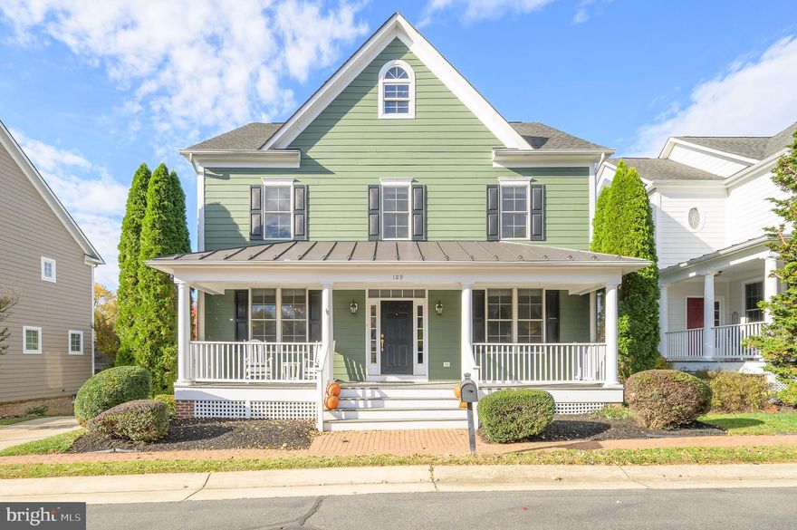 This stunning, move-in-ready home truly has it all — location, charm, and modern comfort! Perfectly situated within walking distance to shops, restaurants, the library, the farmer’s market, and the W&OD Trail, this home blends small-town living with everyday convenience.

Step onto the welcoming front porch and into a light-filled floor plan featuring high ceilings, hardwood floors, and a cozy gas fireplace. The chef’s kitchen offers a large center island with breakfast bar, an abundance of cabinetry, and a seamless flow into the spacious family room—perfect for entertaining. A formal dining room, butler’s pantry, and walk-in pantry complete the main level. Enjoy outdoor relaxation on the covered back porch overlooking peaceful views.

Upstairs, the primary suite features serene pond views, a large walk-in closet, and a beautifully renovated en-suite bath with soaking tub, glass-enclosed shower, dual vanities, and a private water closet. Two additional bedrooms share a jack-and-jill bath with double vanities and separate tub/shower.

The third level offers a versatile bonus room—ideal as a bedroom, office, or playroom! The walk-out lower level includes a finished media room and an additional bright space ready for your personal touch, along with ample storage and utility areas.

An oversized two-car garage and private driveway with generous parking add to the convenience.

Explore nearby wineries, breweries, and hiking trails, including the Appalachian Trail—just moments away.