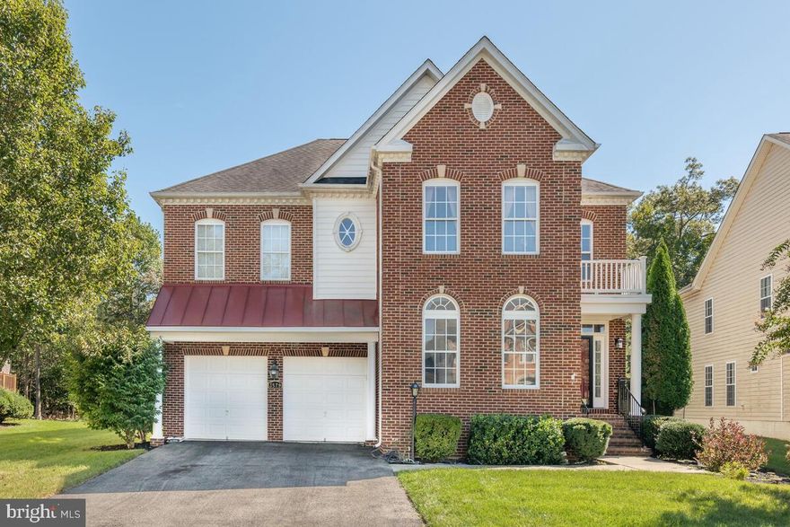 This is beautiful home located in the Brentwood community is loaded with more features than its new construction neighbors! It boasts over 4,000 sq ft of living area,  4 bedrooms and 4.5 bathrooms. Enter into the sunlit entrance to find gleaming mahogany floors, chair railing design lining the walls, and dignified pillars leading a  refined waiting room. As you journey back you will see the half bath perfect for guests and an open dining room with tray ceilings. The kitchen features a large island with granite countertops, stainless steel appliances, and a luminous morning room. The living room features a 2 story foyer and office off to the side. Upstairs the second level is more than meets the eye with 2 bedrooms,  a full hall bathroom,  and an in-law suite with it's own full bathroom. The spacious master has it's own bumped out sitting area, 2 walk-in closets, full bathroom with a soak-in tub and standing shower. Down in the basement you will find the perfect space for entertaining featuring a full bathroom, built-in bar, and a bonus room awaiting your finishing touch.  This home is one of a kind and a MUST SEE, don't hesitate to schedule a tour today!